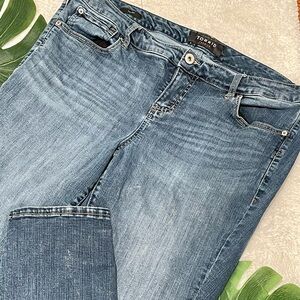 Torrid Premium skinny mid rise medium wash jeans.